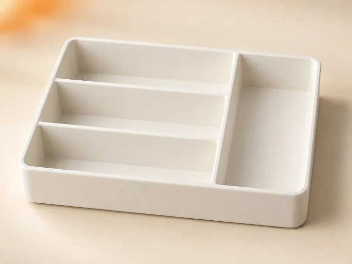 White custom organizer tray with three wide compartments and one long side compartment
